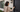 Woman entering her house using a smart door lock to unlock her front door